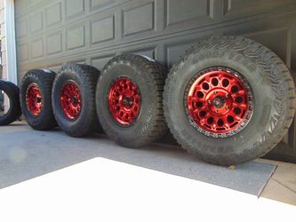 18X9 Gloss Red/Black Fittipaldi Offroad Rims 305 70 18 Goodyear Tires