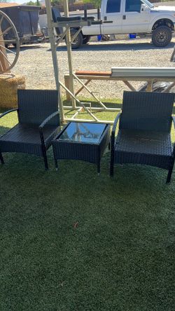 2 Chairs And A Small Table