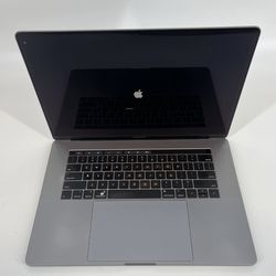MacBook Pro 15 inch touchbar (32gb ram) with charger