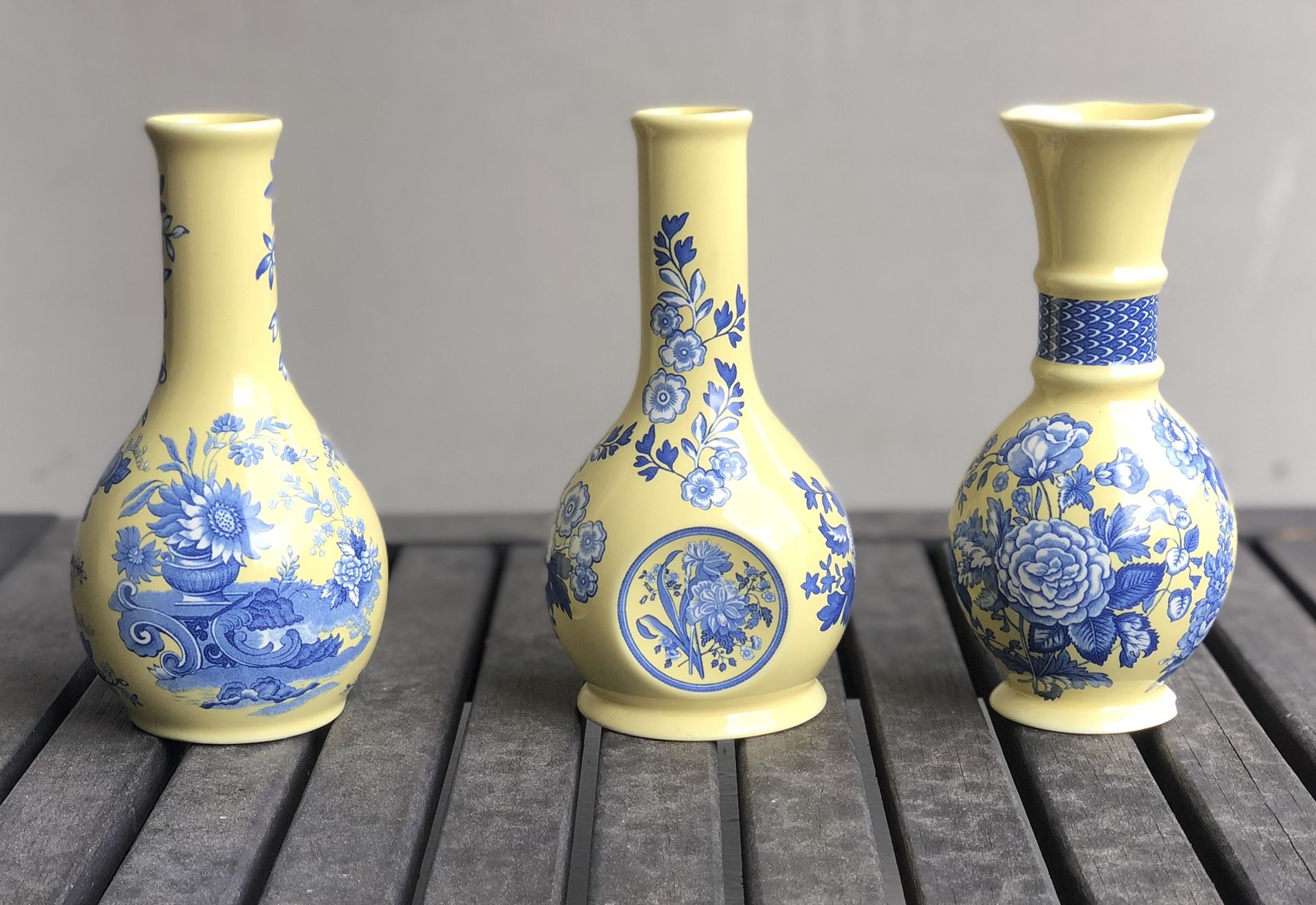 Small yellow and blue floral vases