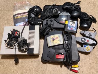 Video game console lot Nintendo n64 sega genesis not tested!