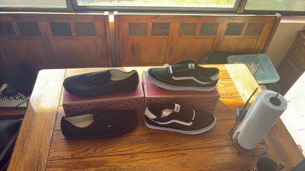 Two Pairs Of Vans All Black And Black And White