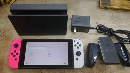 NINTENDO SWITCH HAC-001 w white and pink joy cons grip dock station charger. used. tested. in a good working order. factory reset was done. f25001