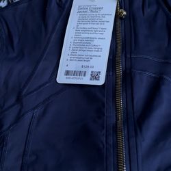 Lululemon Define set including the jacket and leggings in size 2 in the color black