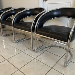 Set of 4 Mid Century Modern Black and Chrome Cantilever Chairs