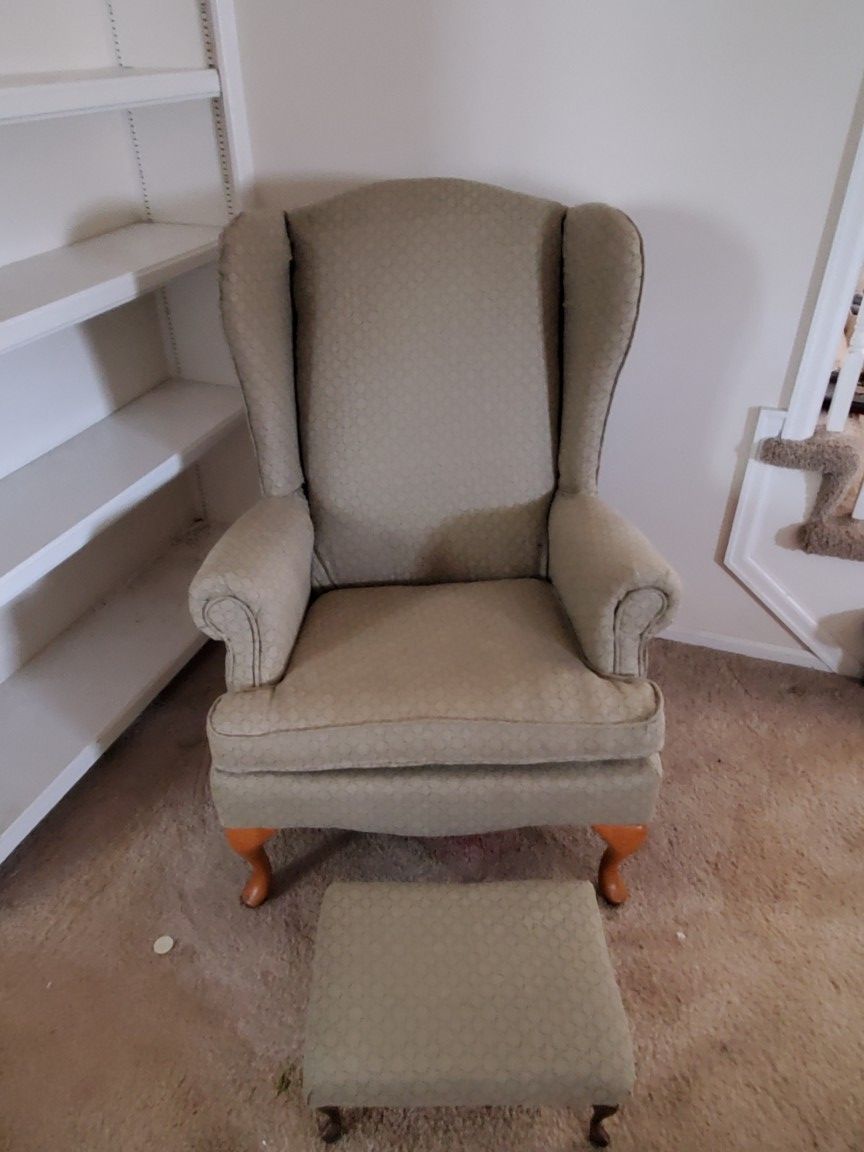 Wing back chair with footstool