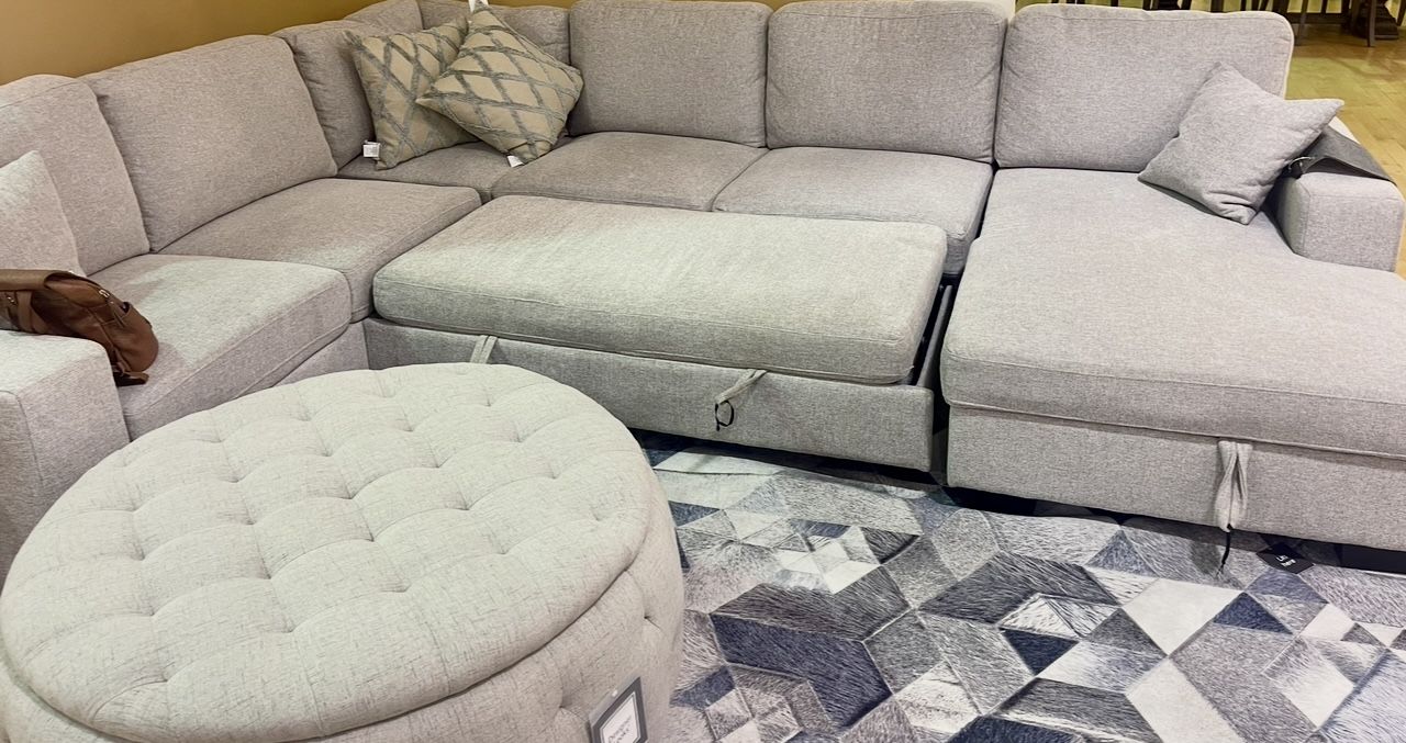 Brand New Sectional With Under Pull Out Bed-Ottoman
