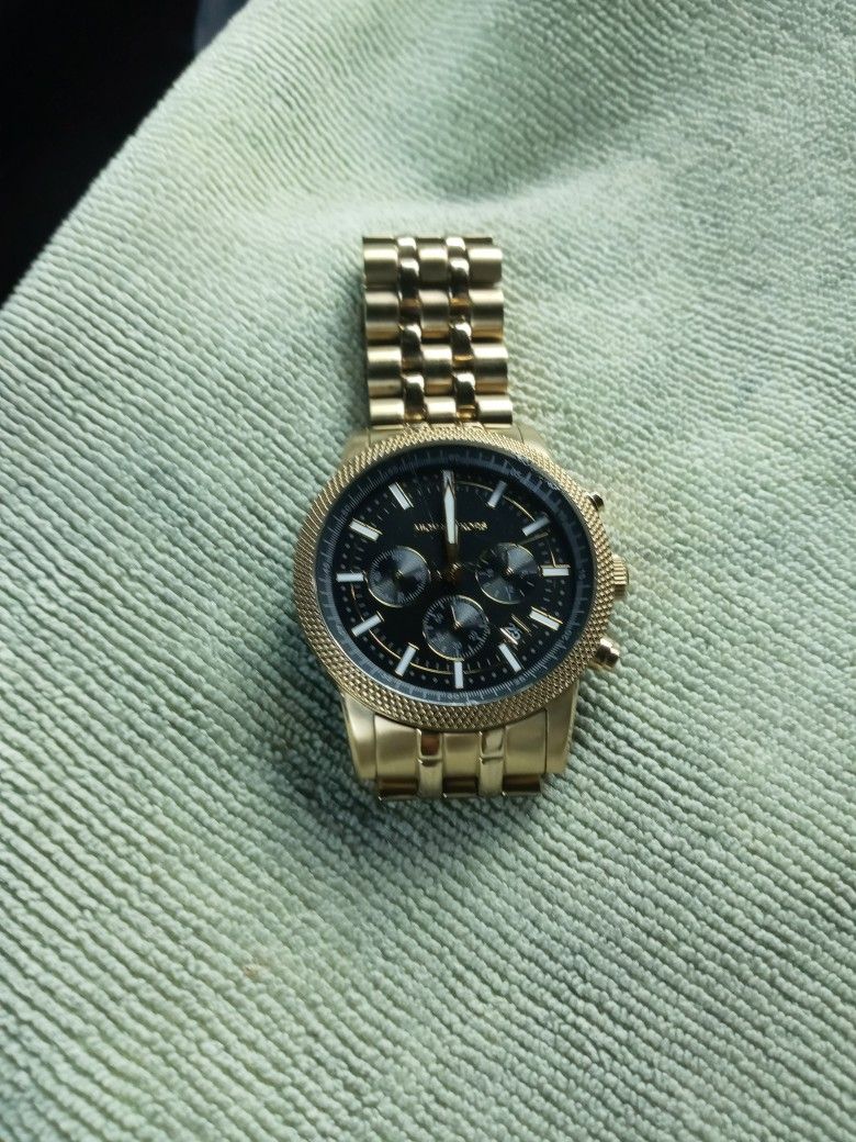 Micael. Kors. Wach