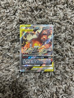 Reshiram & Charizard tag team GX Black Star Promo