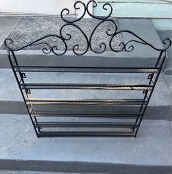 Black scrollwork 6-tier wall-mounted metal rack for nail polish etc