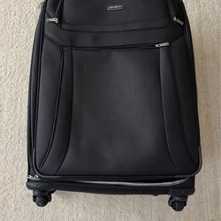 Wheeled suitcase for air travel