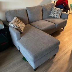 Modern Gray Living Spaces Sectional Sofa with Reversible Chaise