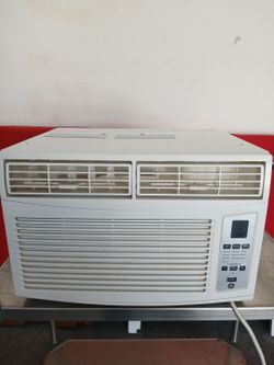 AC    GE   Good Condition  with  remote control 600BTU/hR