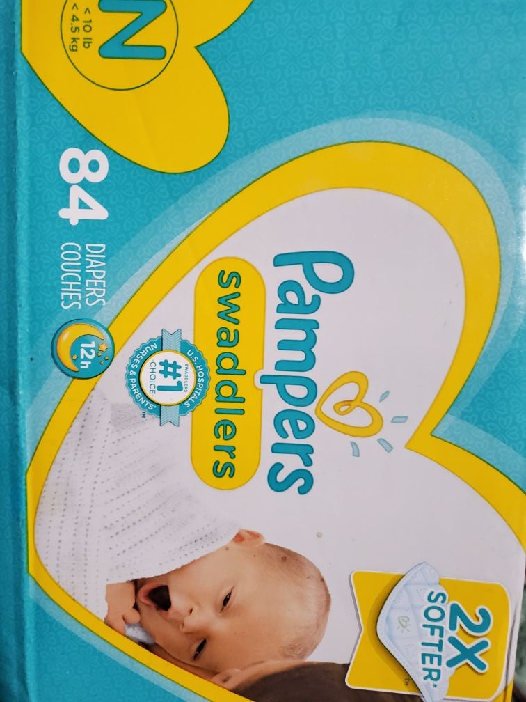 Unopened Newborn diapers 84 count Pampers Swaddlers