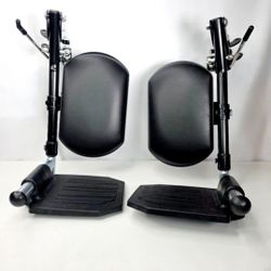 WHEELCHAIR ADJUSTABLE FOOTRESTS 