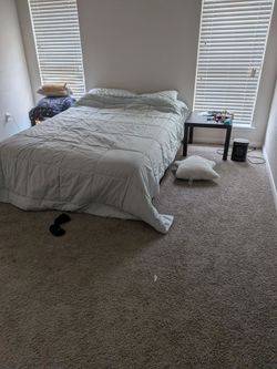 Queen size bed in great shape with waterproof cover