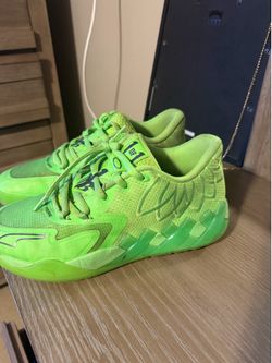 Melo sneakers size 10