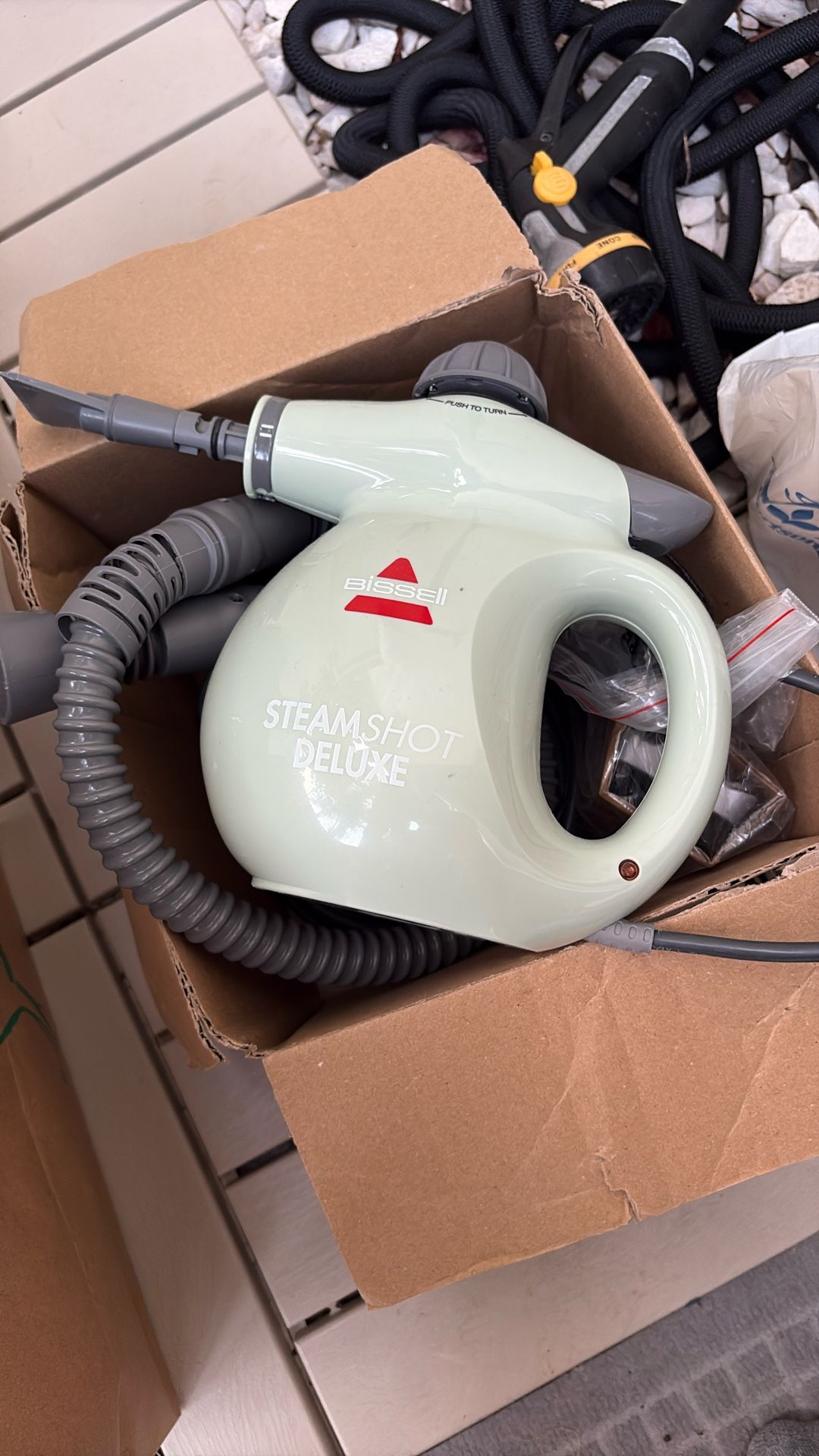 Steam Shot Deluxe handheld