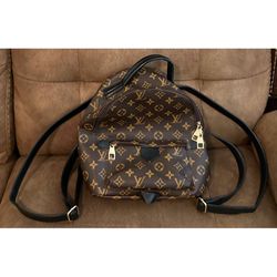 Louis Vuitton Brown And Tan monogram Logo Mini Backpack