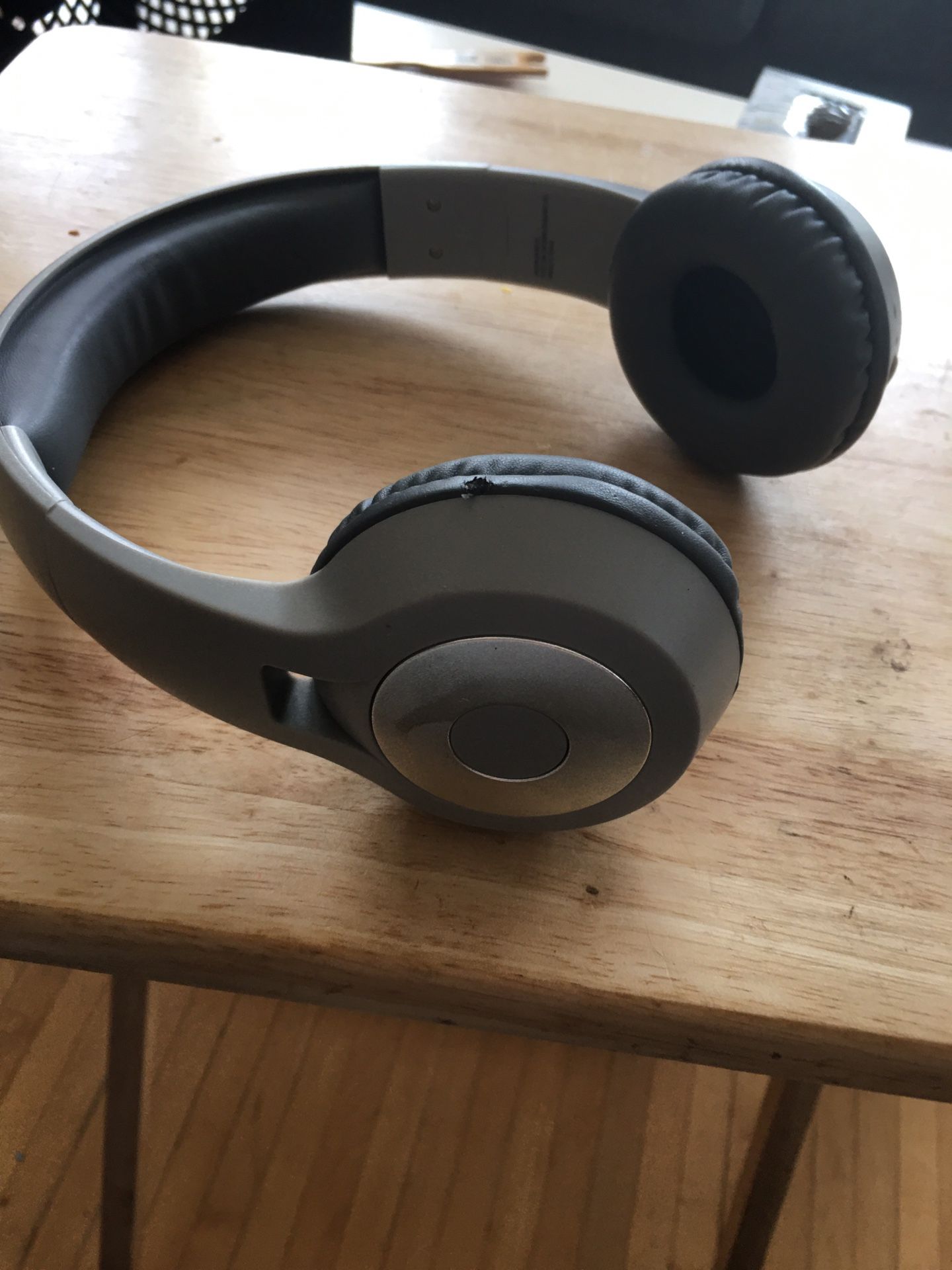 grey bluetooth headphones