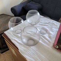 Four Glass Globes