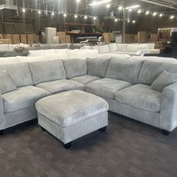 Gray Comfy Sectional And Ottoman 