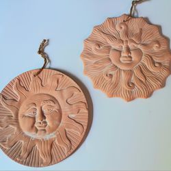 Vintage set of 2 / 3d style terracotta sun face hanging pottery. 