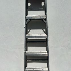 Red ladder for sale. Please make offer.