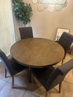 Round dining table and 4 chairs