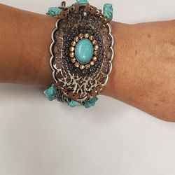 Vintage Bracelet With Large Filligre Medallion With Faux Turquoise and Champaign Rhinestones attached to five strands of faux turquoise