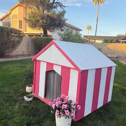 House for Big Dog. It measures 3’9” long and 3’11” high. It has Air Conditioning. It was made for a German Shepherd. Color half pink and half beige as