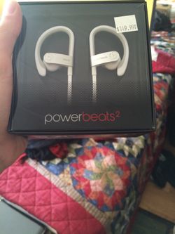 White Powerbeats 2 headphones