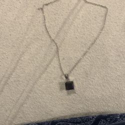 Elegant Silver Necklace with Purple Pendant