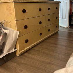 bedroom set with two bedside tables and a dresser