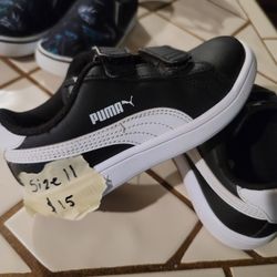 Boys Pumas in New condition 