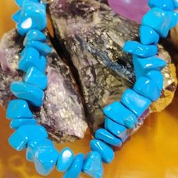 INNER PEACE, BLUE HOWLITE. PROMOTES HARMONY, IT IS BELIEVED TO HOLD HEALING PROPERTIES. 18