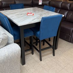 36 inch high table with 424 inch blue stools brand new
