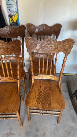 Set of four dining room chairs solid wood oak with dragon head back design