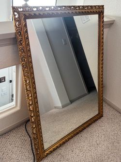 Wooden ornate gold vintage mirror