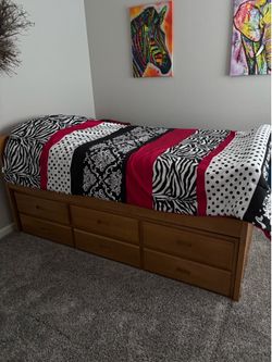 CUTE  WOODEN  TRUNDLE BED for sale