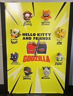 Hello kitty/ Godzilla happy meal toys