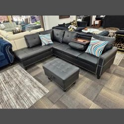 Black faux leather 3 pc sectional sofa with ottoman 