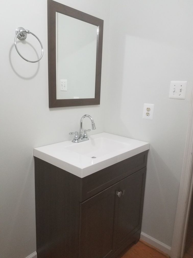 Vanity w/mirror and towel holder