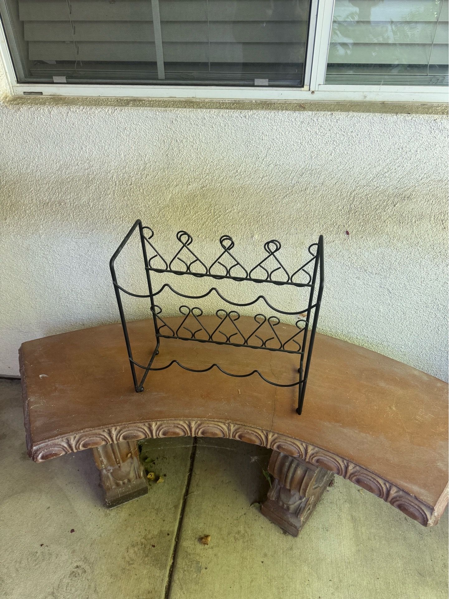 Metal wine rack. Holds 8 bottles