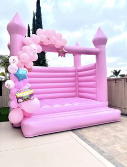 Pink Bounce Castle With Pink Kid Chairs And Table