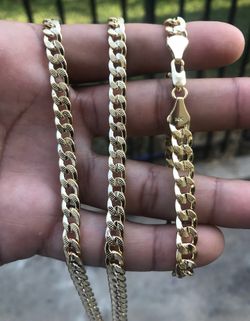 14k gold plated Cuban link chains and bracelets