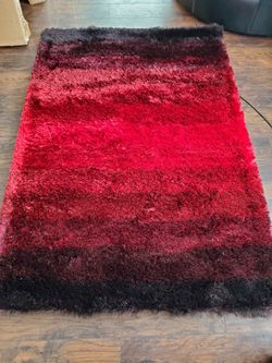 BRAND NEW shaggy Red/black Rug