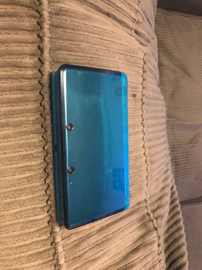 Blue 3DS with games and case