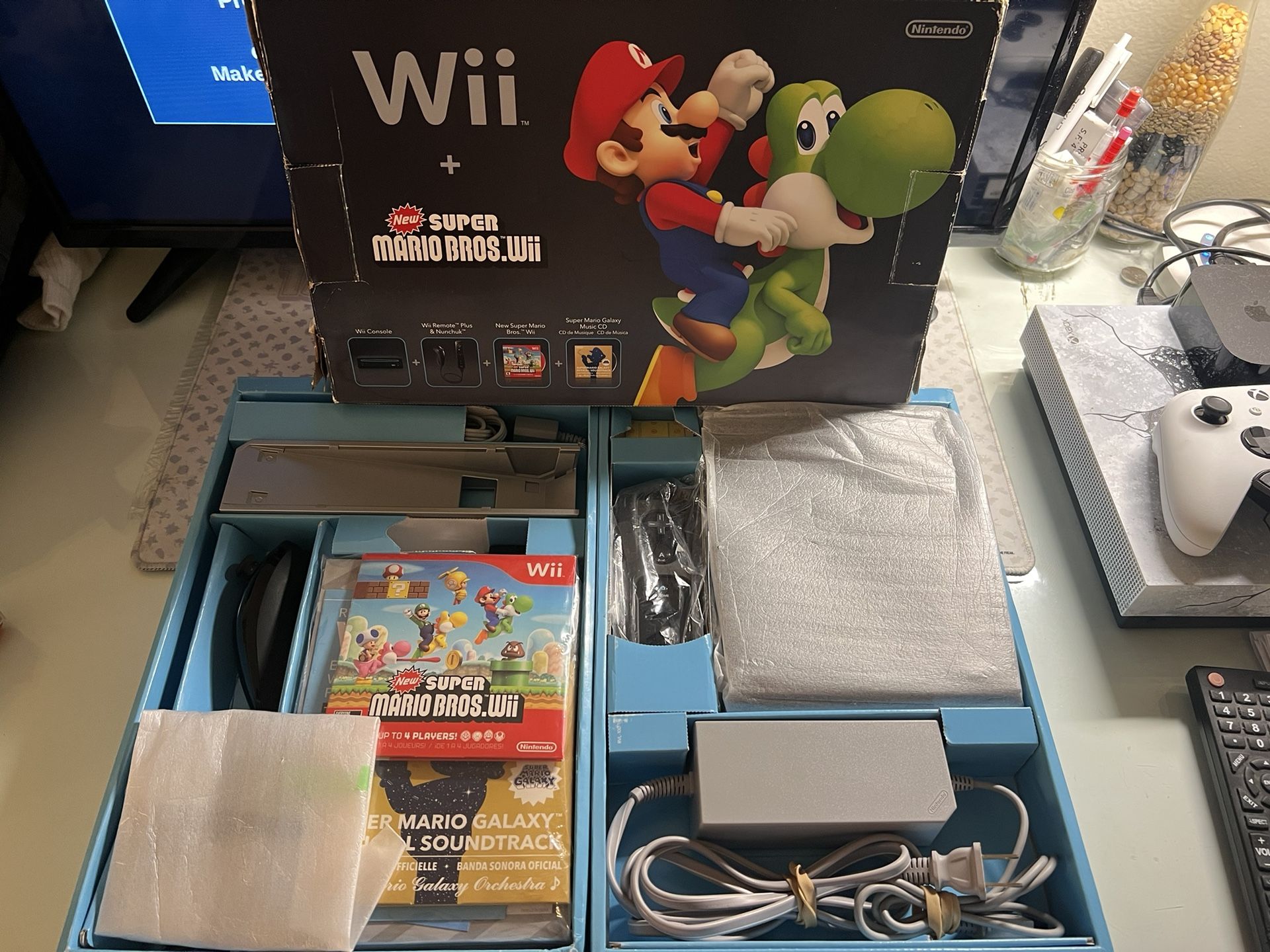 Nintendo Wii + New Super Mario Bros. Wii
