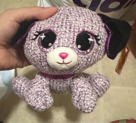 Knit purple dog stuffed animal